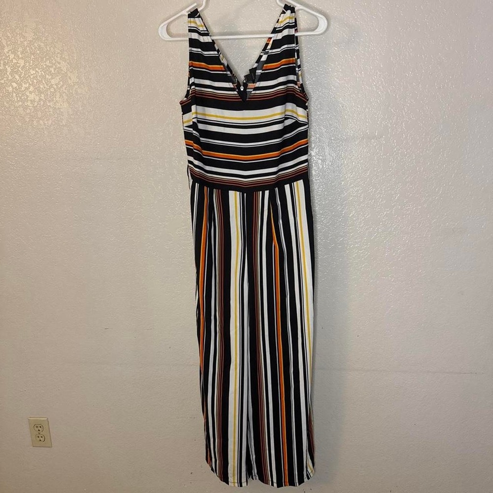 NWT Striped jumpsuit with vertical stripes